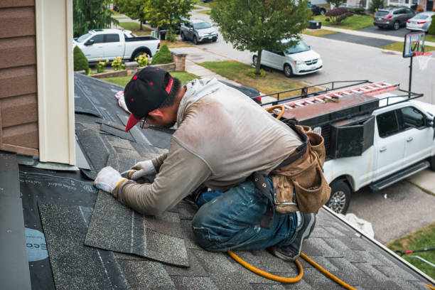 Professional Roofing technician working in Angels Camp, CA